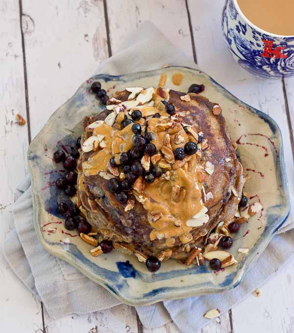 Calling all health junkies, these pancakes are for you! Not your mama's Saturday morning pancakes, these Health Nut Blueberry Pancakes are made with buckwheat flour, kefir and wild blueberries, and are sure to please even the pickiest palate. Gluten free.