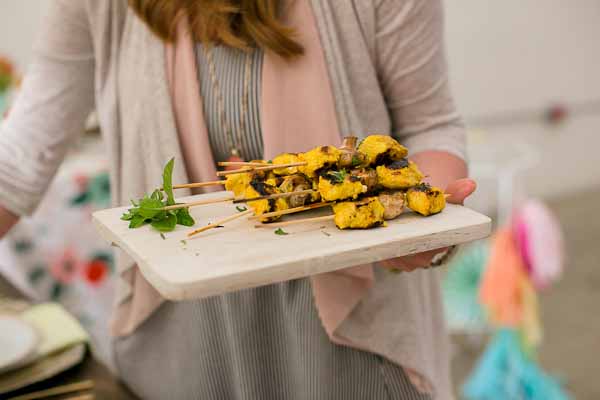  These Tandoori Chicken Skewers are juicy, moist and full of that bold Indian flavor. The chicken is marinated in Greek yogurt, lemon, and turmeric and grilled to perfection. Serve right off the grill with warm garlicky naan bread.