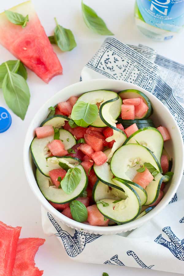 This Watermelon Cucumber Salad is all about fresh summer produce and just 5 ingredients. Watermelon, cucumber, basil and coconut water will hydrate and make you feel refreshed from the inside out. 