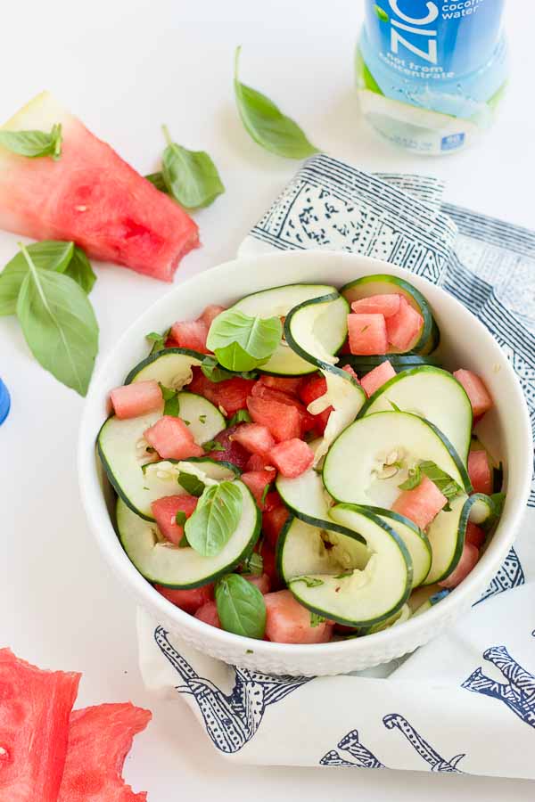 This Watermelon Cucumber Salad is all about fresh summer produce and just 5 ingredients. Watermelon, cucumber, basil and coconut water will hydrate and make you feel refreshed from the inside out. 