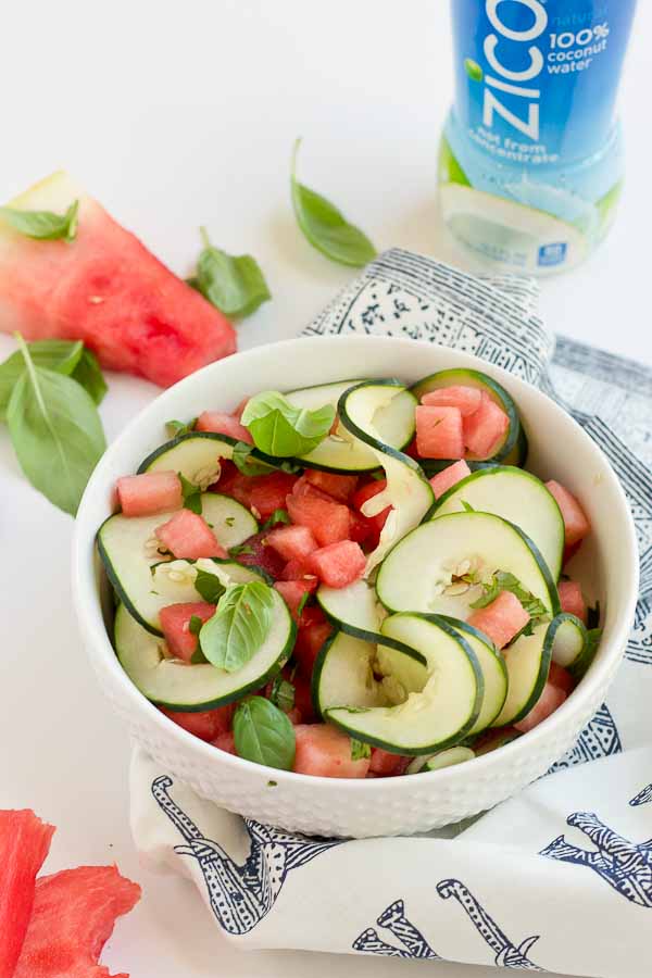 This Watermelon Cucumber Salad is all about fresh summer produce and just 5 ingredients. Watermelon, cucumber, basil and coconut water will hydrate and make you feel refreshed from the inside out. 