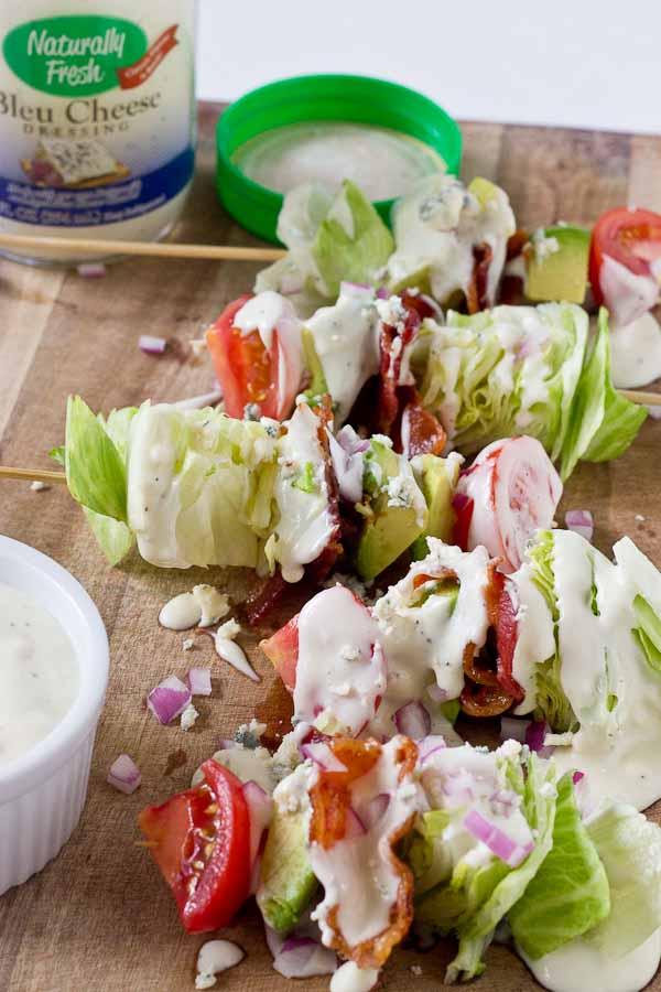 Wedge Salad Skewers…. Iceberg lettuce, crispy bacon, avocado, tomatoes, and blue cheese dressing on a stick. YUM!! This appetizer is perfect at a cookout or anytime you’re serving a crowd. 