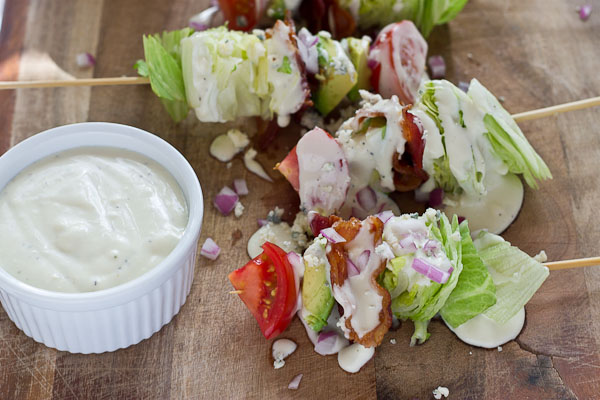 Wedge Salad Skewers…. Iceberg lettuce, crispy bacon, avocado, tomatoes, and blue cheese dressing on a stick. YUM!! This appetizer is perfect at a cookout or anytime you’re serving a crowd. 