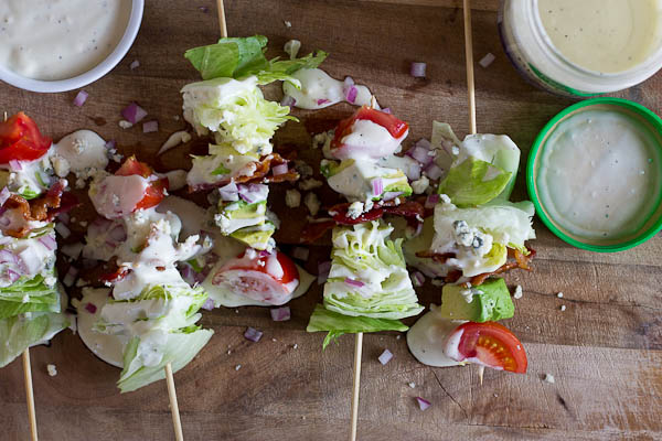 Wedge Salad Skewers…. Iceberg lettuce, crispy bacon, avocado, tomatoes, and blue cheese dressing on a stick. YUM!! This appetizer is perfect at a cookout or anytime you’re serving a crowd. 