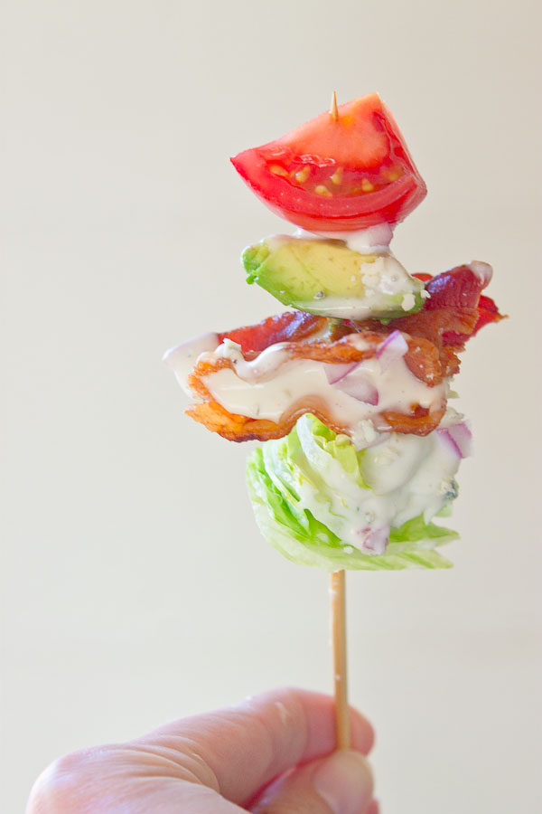 Wedge Salad Skewers…. Iceberg lettuce, crispy bacon, avocado, tomatoes, and blue cheese dressing on a stick. YUM!! This appetizer is perfect at a cookout or anytime you’re serving a crowd. 