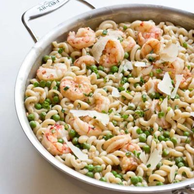 Your favorite food as a kid just grew up... peas, shallots, wild red shrimp, gruyere and cheddar cheese. get a bowl of this Shrimp Mac n Cheese ASAP!