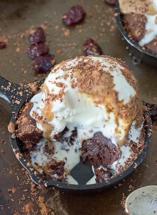 To get this healthy decadent perfect Double Chocolate Cherry Skillet Brownie.. this is what went down in my kitchen, aside from a BIG multi day mess. I made this recipe with 100% almond butter, 100% coconut oil, a mixture of AB and coconut oil, honey only, varying amounts of brown sugar, no flour, buckwheat flour, white whole wheat flour, with coffee and without, different oven temperatures, whipping the eggs first verses stirring them in later, 1-2-3 eggs, more chocolate and less chocolate. Don’t worry, we went with more chocolate.