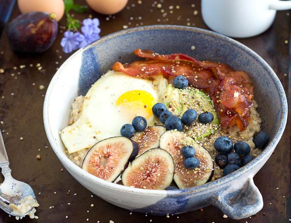 It's time to shake up that sweet oatmeal bowl and make it savory with bacon, eggs, and avocado! This Savory Oatmeal Bowl is high protein and will keep you energized all morning long.