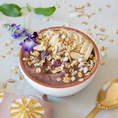 This Banana Peanut Butter Breakfast Bowl is seriously the best smoothie bowl ever. It's naturally sweetened with medjool dates, bananas and power packed with antioxidants from unsweetened acai. The creaminess factor was upped with plain kefir and peanut butter and topped with bananas (naturally) and gluten free muesli for irresistible crunch in every bite.