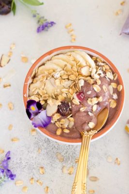 This Banana Peanut Butter Breakfast Bowl is seriously the best smoothie bowl ever. It's naturally sweetened with medjool dates, bananas and power packed with antioxidants from unsweetened acai. The creaminess factor was upped with plain kefir and peanut butter and topped with bananas (naturally) and gluten free muesli for irresistible crunch in every bite.