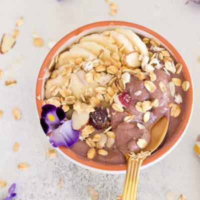 This Banana Peanut Butter Breakfast Bowl is seriously the best smoothie bowl ever. It's naturally sweetened with medjool dates, bananas and power packed with antioxidants from unsweetened acai. The creaminess factor was upped with plain kefir and peanut butter and topped with bananas (naturally) and gluten free muesli for irresistible crunch in every bite.