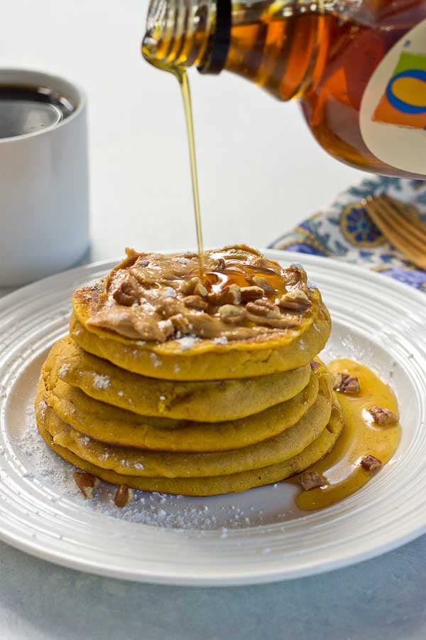 Peanut Butter Pumpkin Pancakes, need I say more? Get in my belly already! Super easy recipe made with box pancake mix to simplify your mornings. 