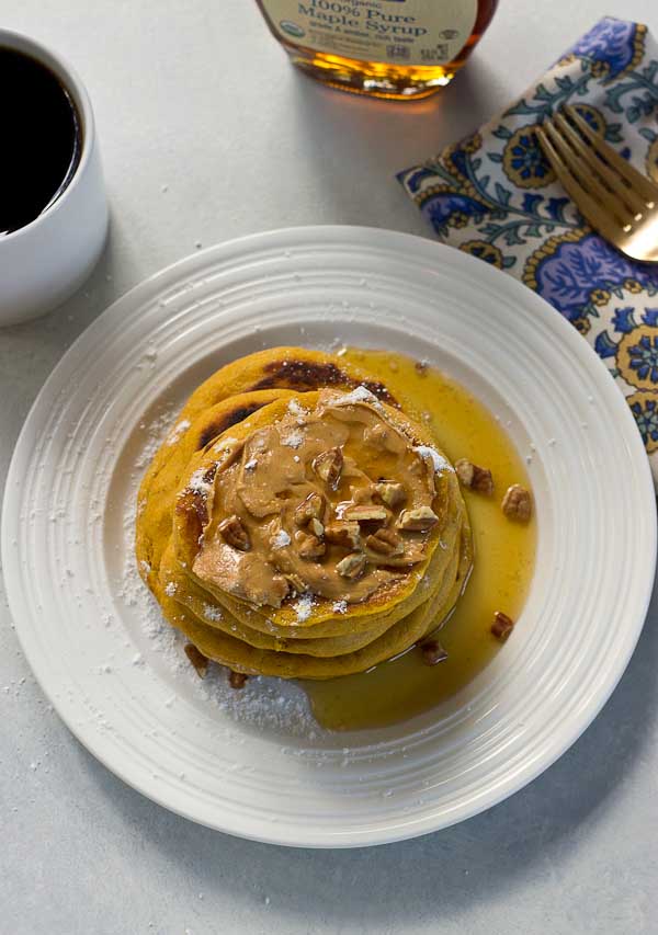 Peanut Butter Pumpkin Pancakes, need I say more? Get in my belly already! Super easy recipe made with box pancake mix to simplify your mornings. 