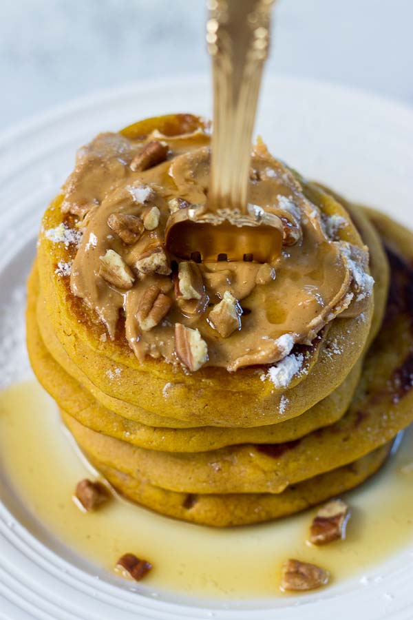 Peanut Butter Pumpkin Pancakes, need I say more? Get in my belly already! Super easy recipe made with box pancake mix to simplify your mornings. 