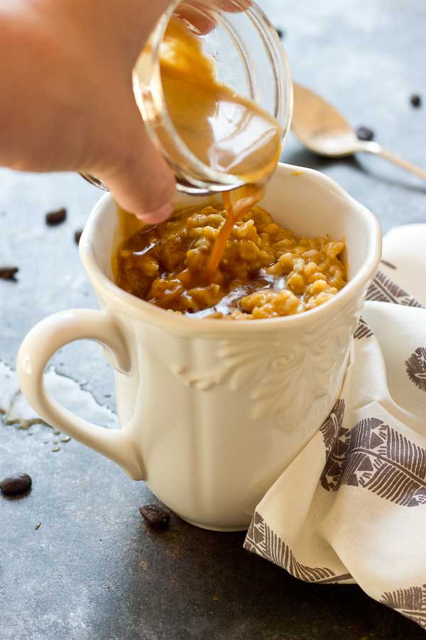 This Pumpkin Spice Oatmeal Latte is just what you need on a cozy fall morning. Your favorite things in one mug... pumpkin, oats, espresso and steamed milk! Grab a spoon. 