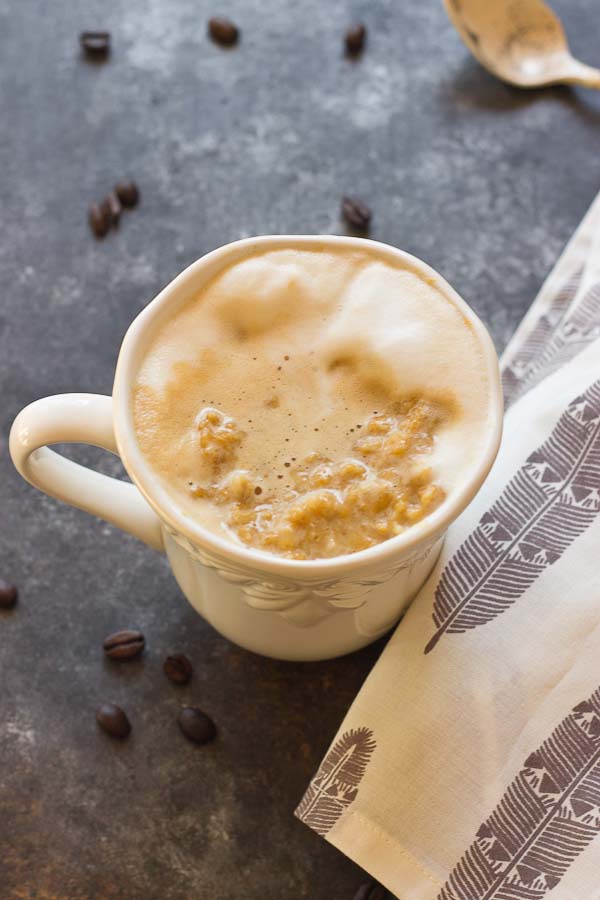 This Pumpkin Spice Oatmeal Latte is just what you need on a cozy fall morning. Your favorite things in one mug... pumpkin, oats, espresso and steamed milk! Grab a spoon. 