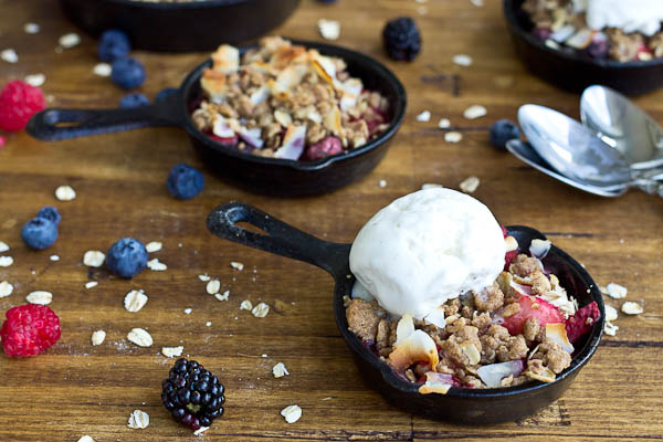 Soak up the last of summer with this Skillet Mixed Berry Oatmeal Crisp. Blueberries, raspberries, strawberries, and blackberries nestled under a warm oatmeal crisp topping and a scoop of Breyers® Natural Vanilla ice cream. So good!