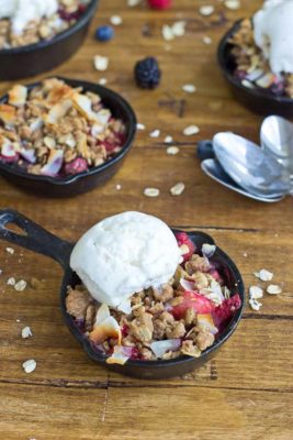 Soak up the last of summer with this Skillet Mixed Berry Oatmeal Crisp. Blueberries, raspberries, strawberries, and blackberries nestled under a warm oatmeal crisp topping and a scoop of Breyers® Natural Vanilla ice cream. So good!