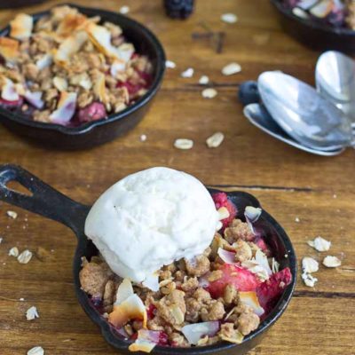 Soak up the last of summer with this Skillet Mixed Berry Oatmeal Crisp. Blueberries, raspberries, strawberries, and blackberries nestled under a warm oatmeal crisp topping and a scoop of Breyers® Natural Vanilla ice cream. So good!