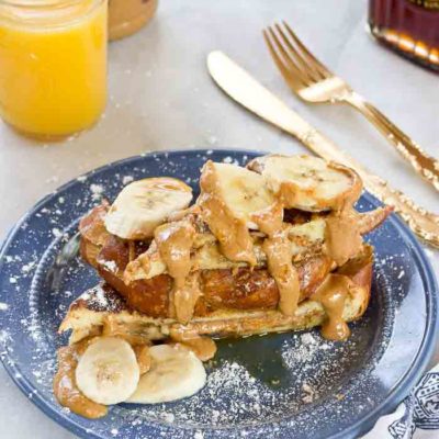 This Creamy Peanut Butter and Banana Stuffed French toast is dabomb dot com. Like I'm so pumped about this flavor combo. Bring on the creamy PB and bananas please!