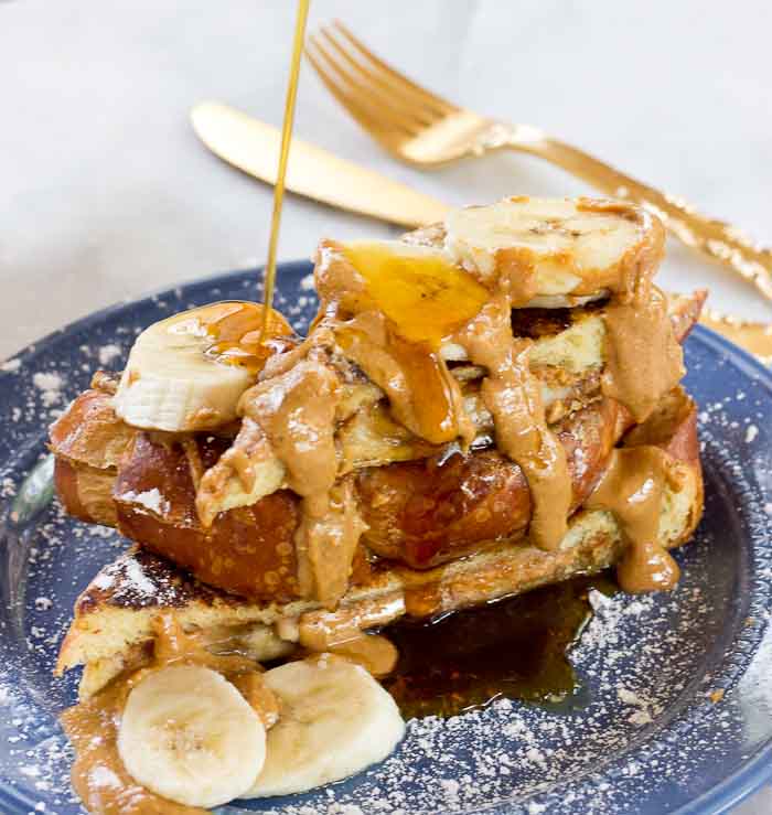 This Creamy Peanut Butter Banana Stuffed French toast is dabomb dot com. Like I'm so pumped about this flavor combo. Bring on the creamy PB and bananas please!