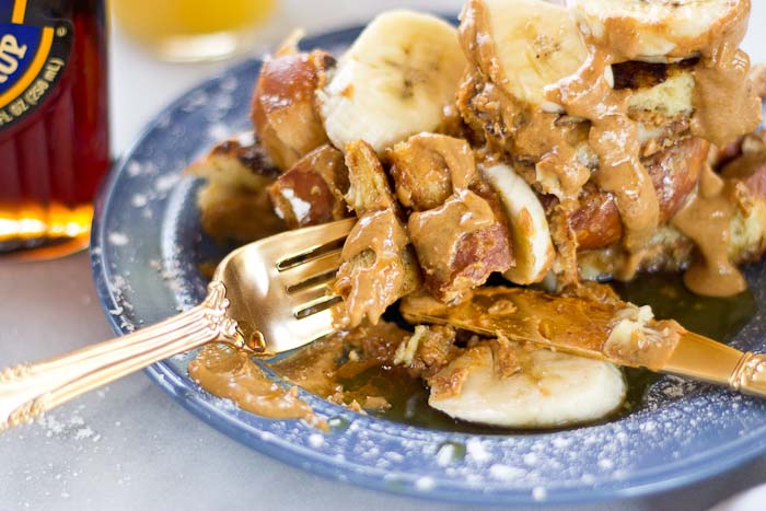 This Creamy Peanut Butter and Banana Stuffed French toast is dabomb dot com. Like I'm so pumped about this flavor combo. Bring on the creamy PB and bananas please!