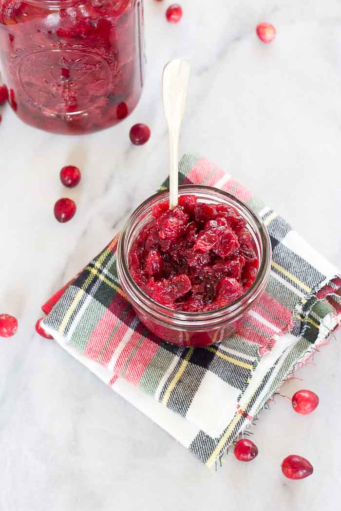 This Spiked Cranberry Chutney not only smells amazing while it's cooking, it’s so freaking good. Fresh cranberries, cinnamon, cloves and aged rum... the perfect topping for everything holiday!