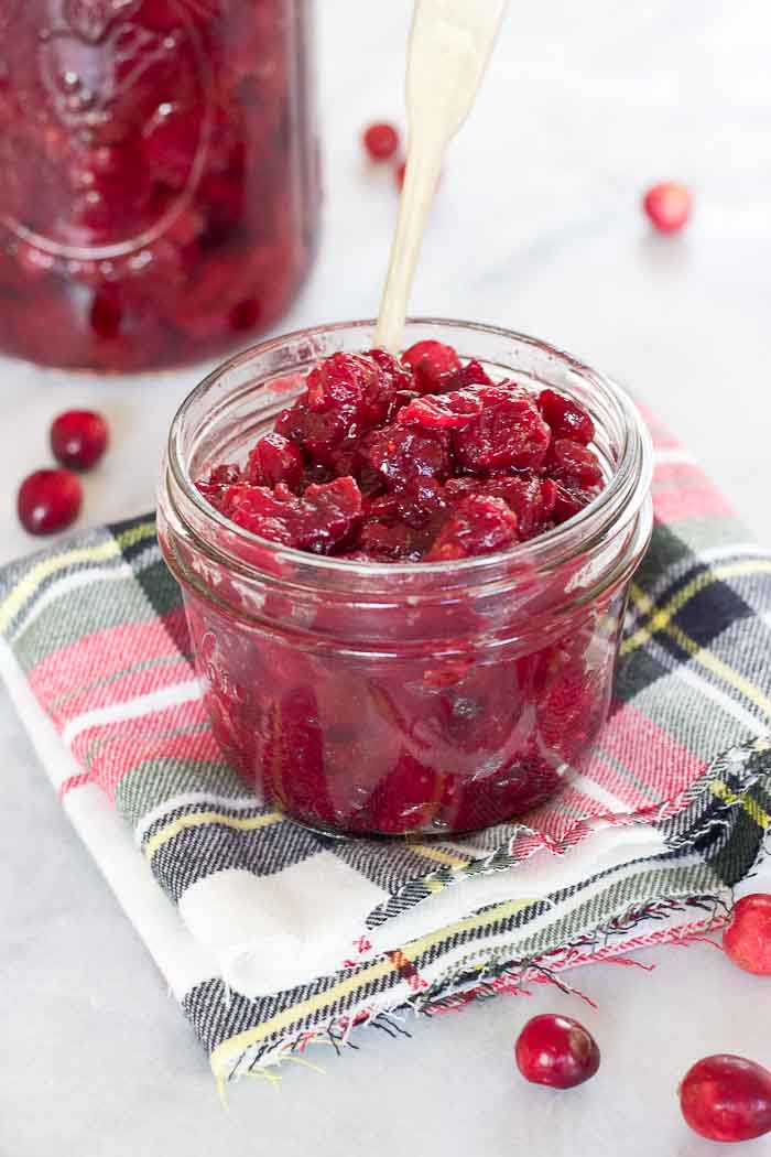 This Spiked Cranberry Chutney not only smells amazing while it's cooking, it’s so freaking good. Fresh cranberries, cinnamon, cloves and aged rum... the perfect topping for everything holiday!