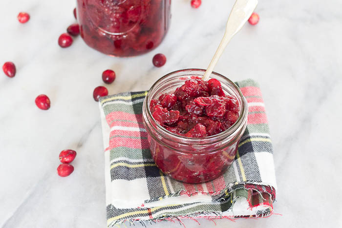 This Spiked Cranberry Chutney not only smells amazing while it's cooking, it’s so freaking good. Fresh cranberries, cinnamon, cloves and aged rum... the perfect topping for everything holiday!