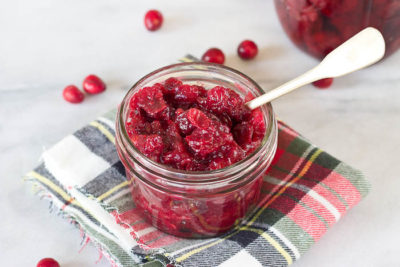 This Spiked Cranberry Chutney not only smells amazing while it's cooking, it’s so freaking good. Fresh cranberries, cinnamon, cloves and aged rum... the perfect topping for everything holiday!