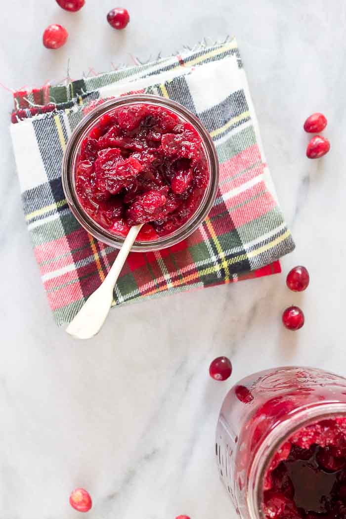 This Spiked Cranberry Chutney not only smells amazing while it's cooking, it’s so freaking good. Fresh cranberries, cinnamon, cloves and aged rum... the perfect topping for everything holiday!