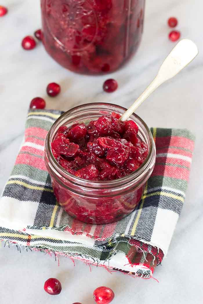 This Spiked Cranberry Chutney not only smells amazing while it's cooking, it’s so freaking good. Fresh cranberries, cinnamon, cloves and aged rum... the perfect topping for everything holiday!