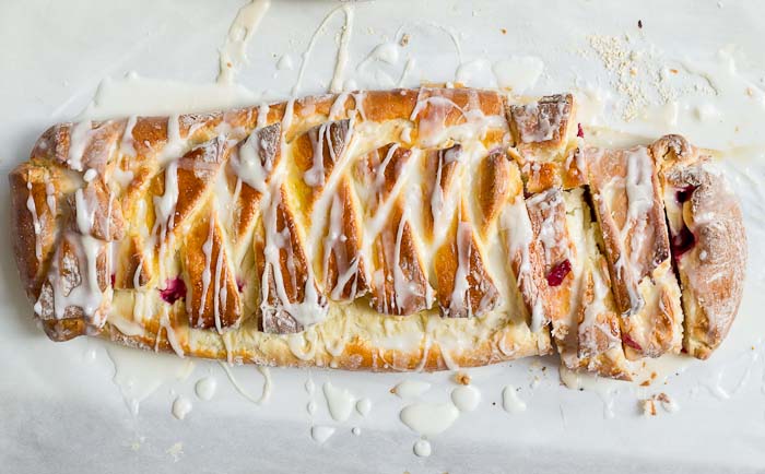 The flavors in this Cranberry Cream Cheese Braid are spot on and bursting with holiday freshness. Cranberries, cream cheese, and pillowy pastry dough...I’m like YIPPEEE! It’s the most wonderful time of the year.