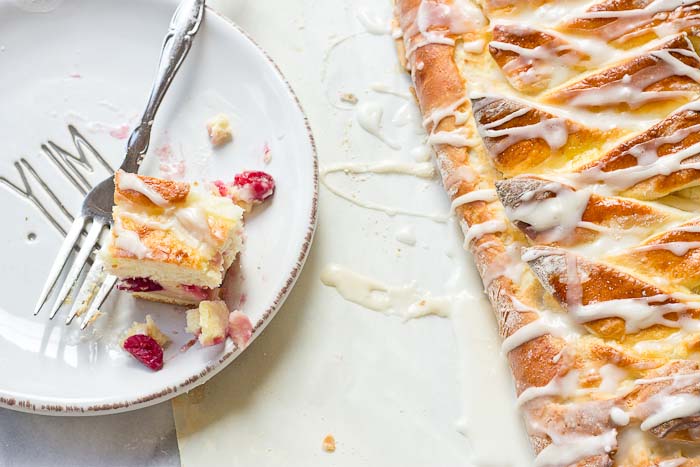 The flavors in this Cranberry Cream Cheese Braid are spot on and bursting with holiday freshness. Cranberries, cream cheese, and pillowy pastry dough...I’m like YIPPEEE! It’s the most wonderful time of the year.