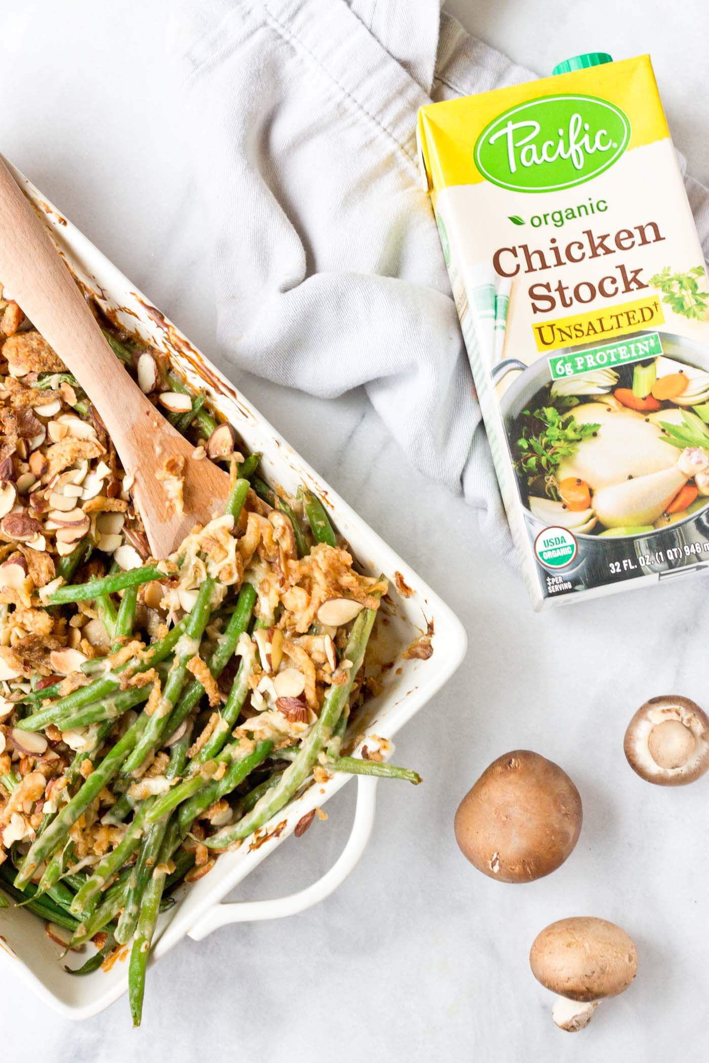 Because we all need Green Bean Casserole in our lives. This is recipe is easy and made with homemade cream of mushroom soup + au gratin topping! Extra crunchies, please!