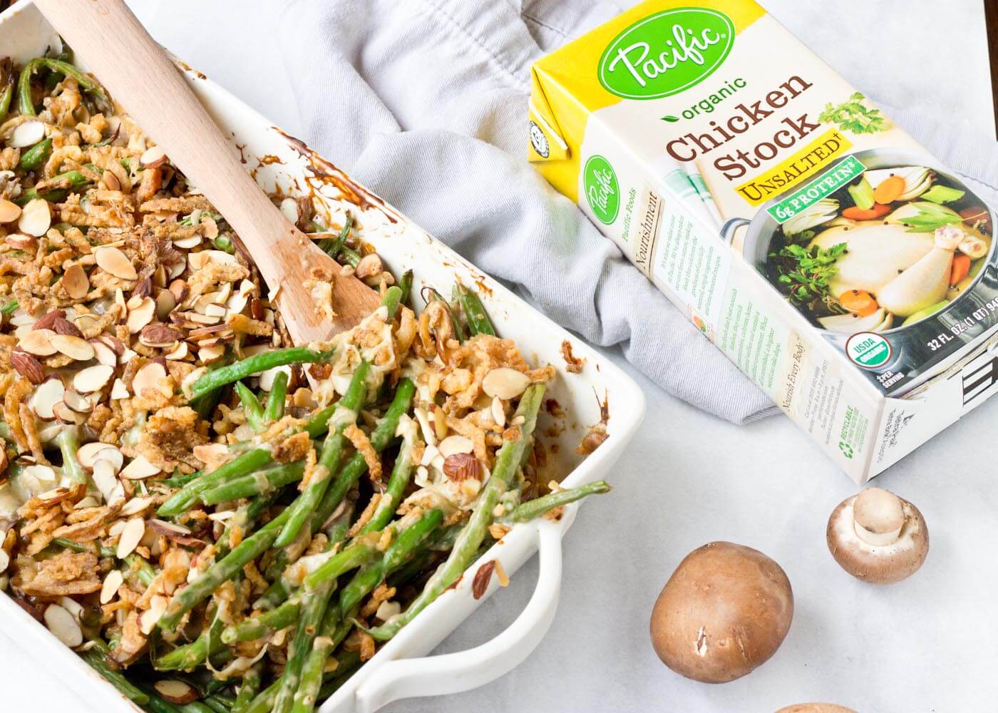 Because we all need Green Bean Casserole in our lives. This is recipe is easy and made with homemade cream of mushroom soup + au gratin topping! Extra crunchies, please!
