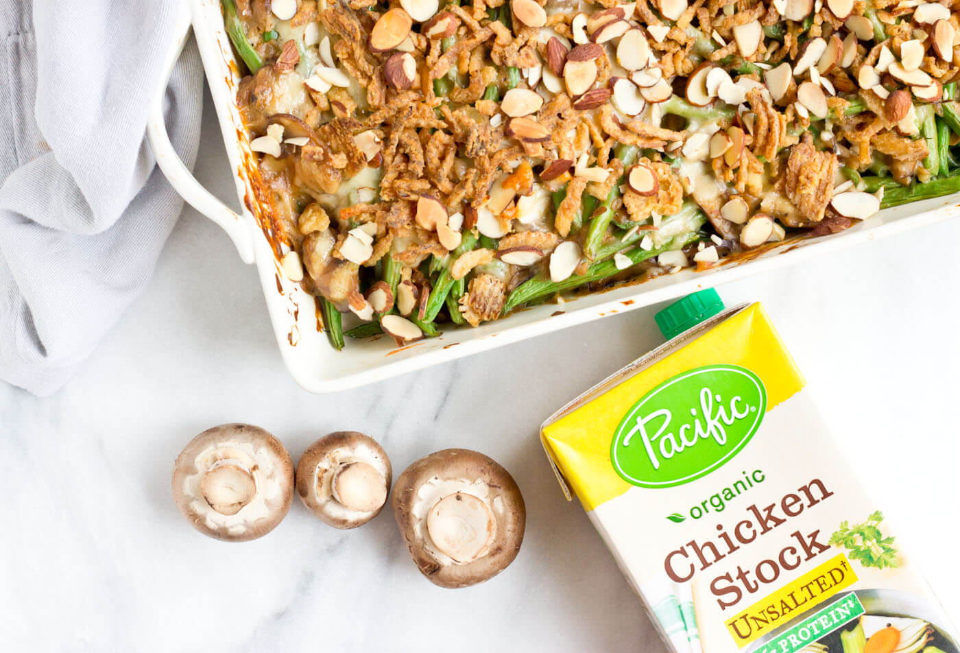 Because we all need Green Bean Casserole in our lives. This is recipe is easy and made with homemade cream of mushroom soup + au gratin topping! Extra crunchies, please!