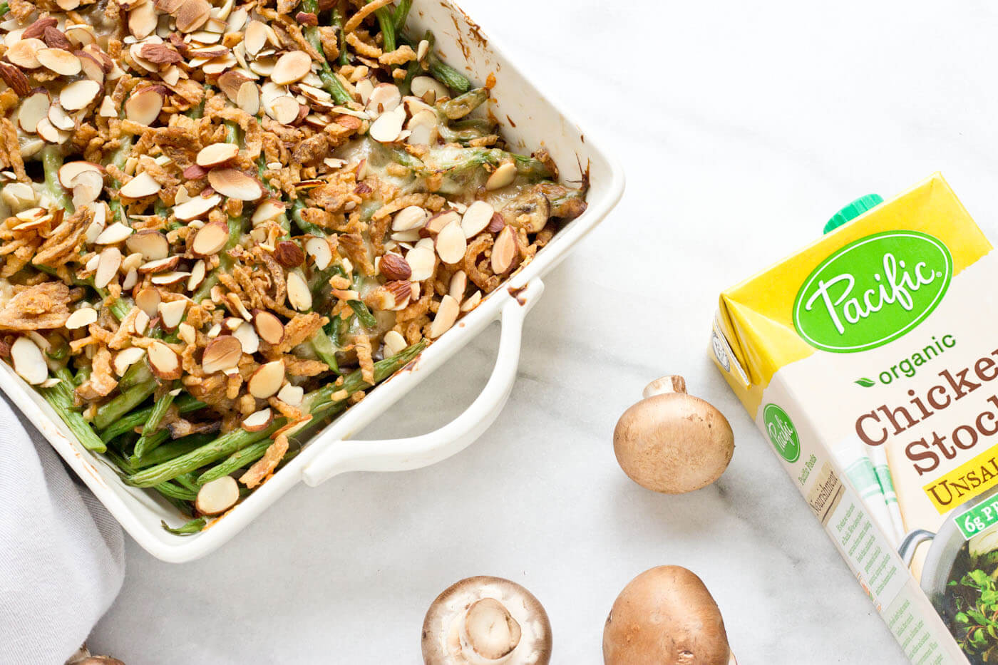 Because we all need Green Bean Casserole in our lives. This is recipe is easy and made with homemade cream of mushroom soup + au gratin topping! Extra crunchies, please!