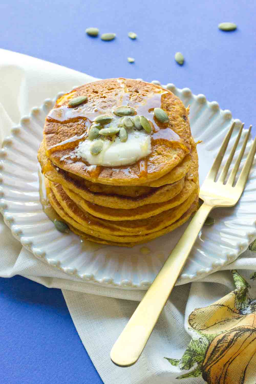 Okay so you want to know how to make restaurant style pancakes?! Use the CAST IRON SKILLET!! It will change your pancake life. Helloooo beautiful stack of Gluten Free Pumpkin Pancakes, my fork is coming for you. 