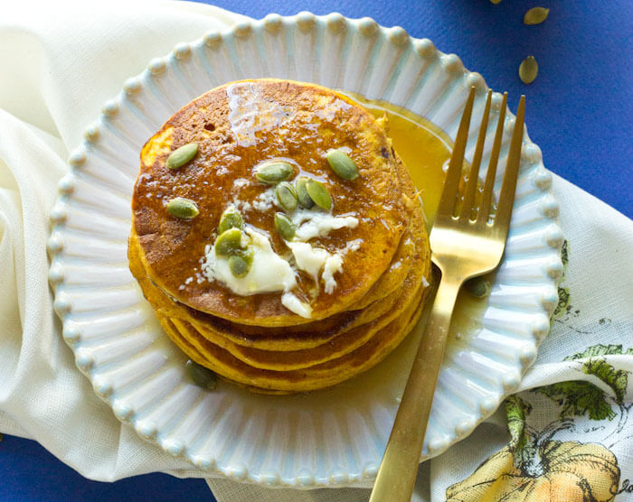 Okay so you want to know how to make restaurant style pancakes?! Use the CAST IRON SKILLET!! It will change your pancake life. Helloooo beautiful stack of Gluten Free Pumpkin Pancakes, my fork is coming for you.