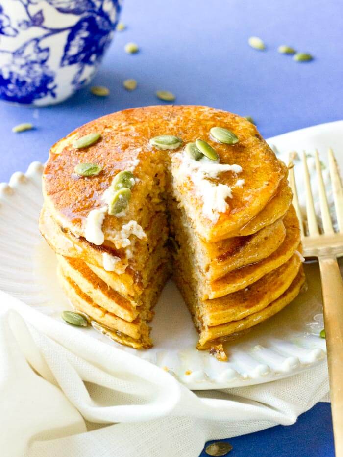 Okay so you want to know how to make restaurant style pancakes?! Use the CAST IRON SKILLET!! It will change your pancake life. Helloooo beautiful stack of Gluten Free Pumpkin Pancakes, my fork is coming for you.