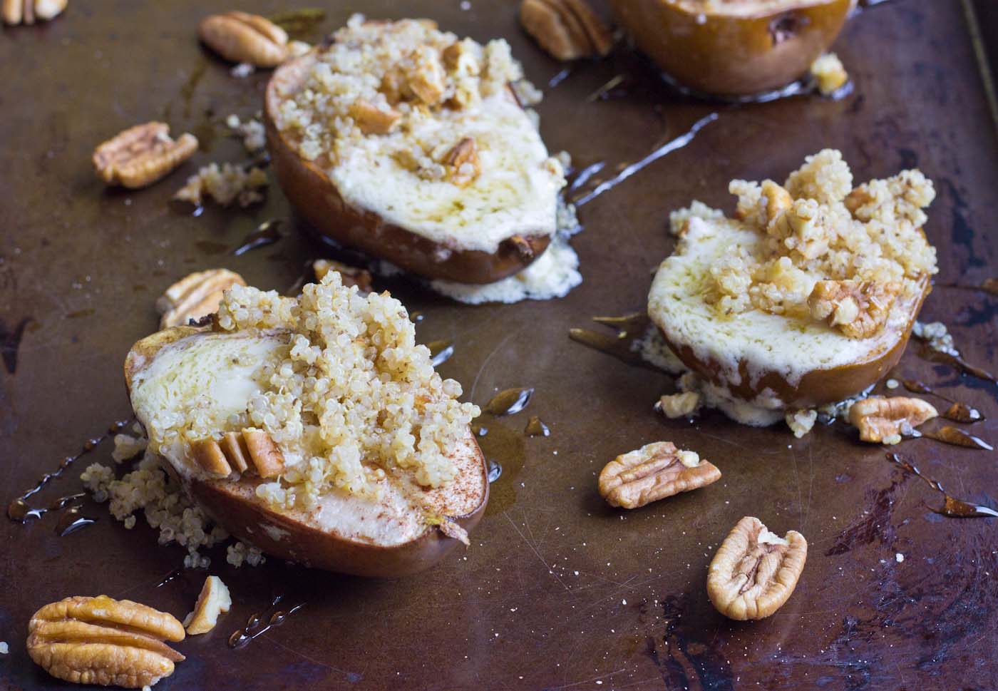 Roasted Quinoa Stuffed Pears are exactly what I want to eat on a cool morning this fall. These pears are stuffed with mascarpone cheese, quinoa, and pecans. So yum!