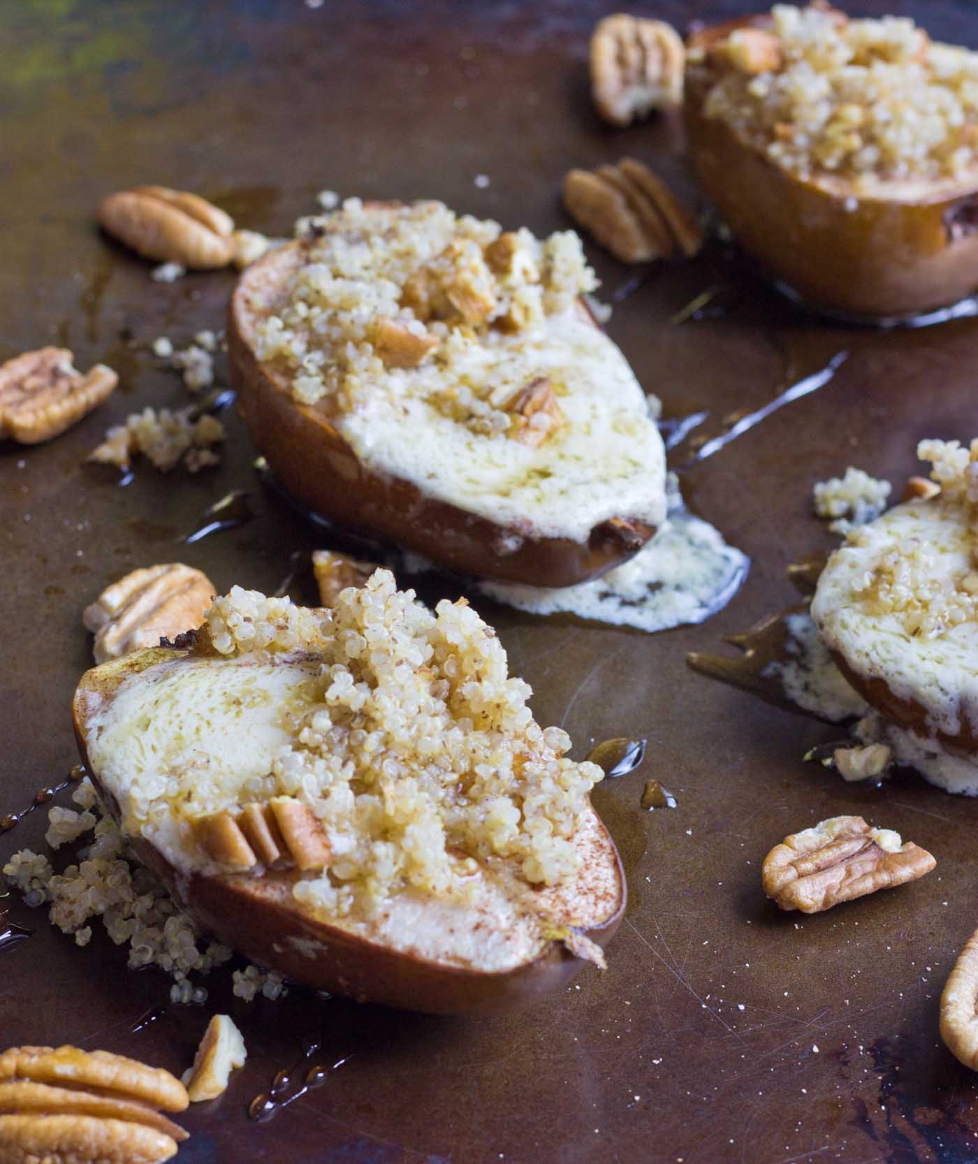 Roasted Quinoa Stuffed Pears are exactly what I want to eat on a cool morning this fall. These pears are stuffed with mascarpone cheese, quinoa, and pecans. So yum!