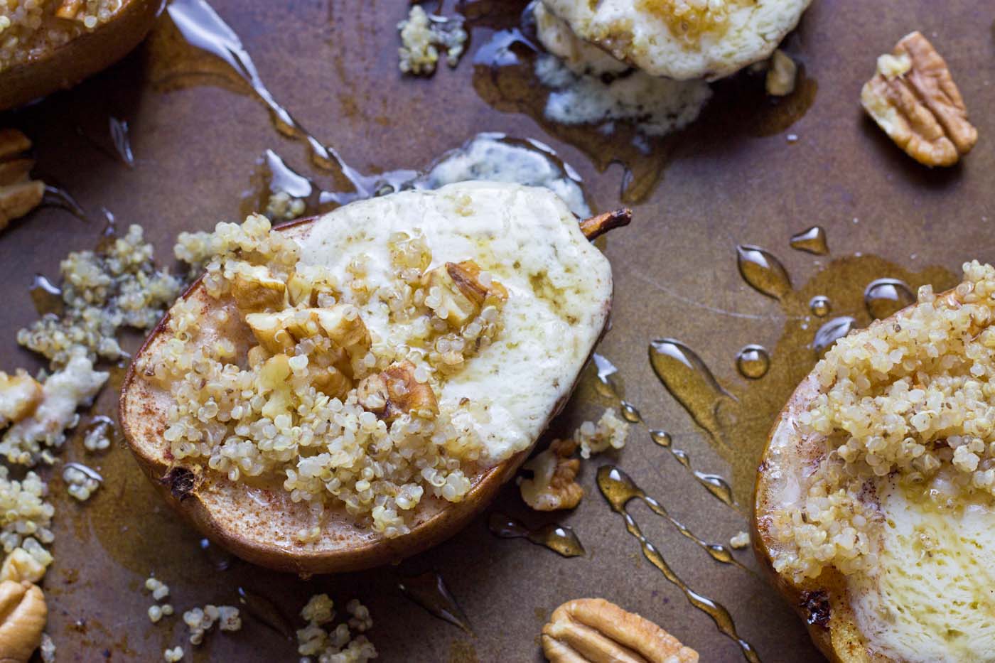 Roasted Quinoa Stuffed Pears are exactly what I want to eat on a cool morning this fall. These pears are stuffed with mascarpone cheese, quinoa, and pecans. So yum!