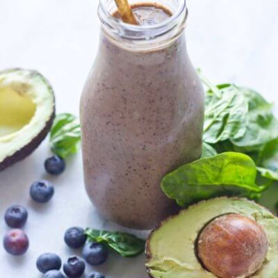 This Tropical Superfood Smoothie is so energizing! A blend of fresh spinach, blueberries, avocado, banana, and pineapple in one glass!