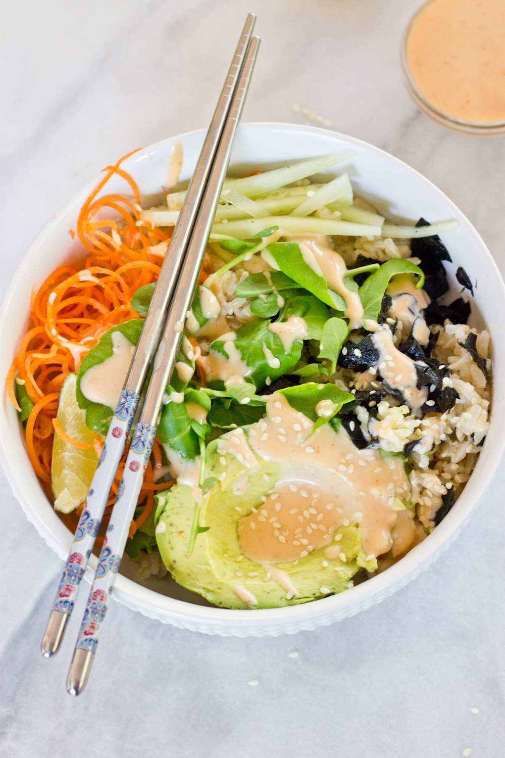 These Vegan Sushi Bowls are making my life right now… because of this spicy dressing. Let’s be honest... it's all about the condiments.