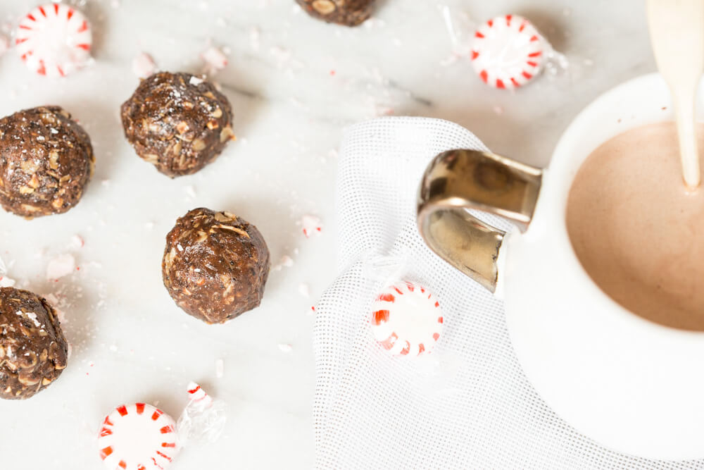 These Peppermint Mocha Energy Bites made with almond butter, oats, and ground coffee are sooo easy to prepare-- all you need is a big bowl and mixing spoon. They make the perfect snack for traveling during the holidays!
