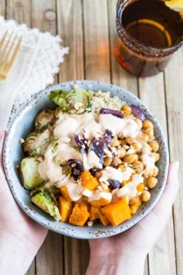 This Vegetarian Nourish Bowl is power packed with nutritious and detoxifying foods that will nourish your body from the inside out! Roasted butternut squash, Brussels sprouts, garbanzo beans and quinoa drizzled with a lemon peanut sauce....YUMMA!