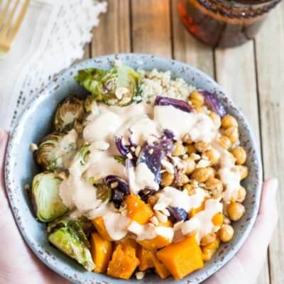 This Vegetarian Nourish Bowl is power packed with nutritious and detoxifying foods that will nourish your body from the inside out! Roasted butternut squash, Brussels sprouts, garbanzo beans and quinoa drizzled with a lemon peanut sauce....YUMMA!