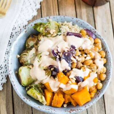 This Vegetarian Nourish Bowl is power packed with nutritious and detoxifying foods that will nourish your body from the inside out! Roasted butternut squash, Brussels sprouts, garbanzo beans and quinoa drizzled with a lemon peanut sauce....YUMMA!